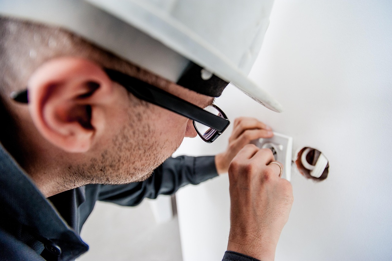electrician — repair — electricity — socket — professional — electric — worker — builder — man — male — helmet — work — elect
